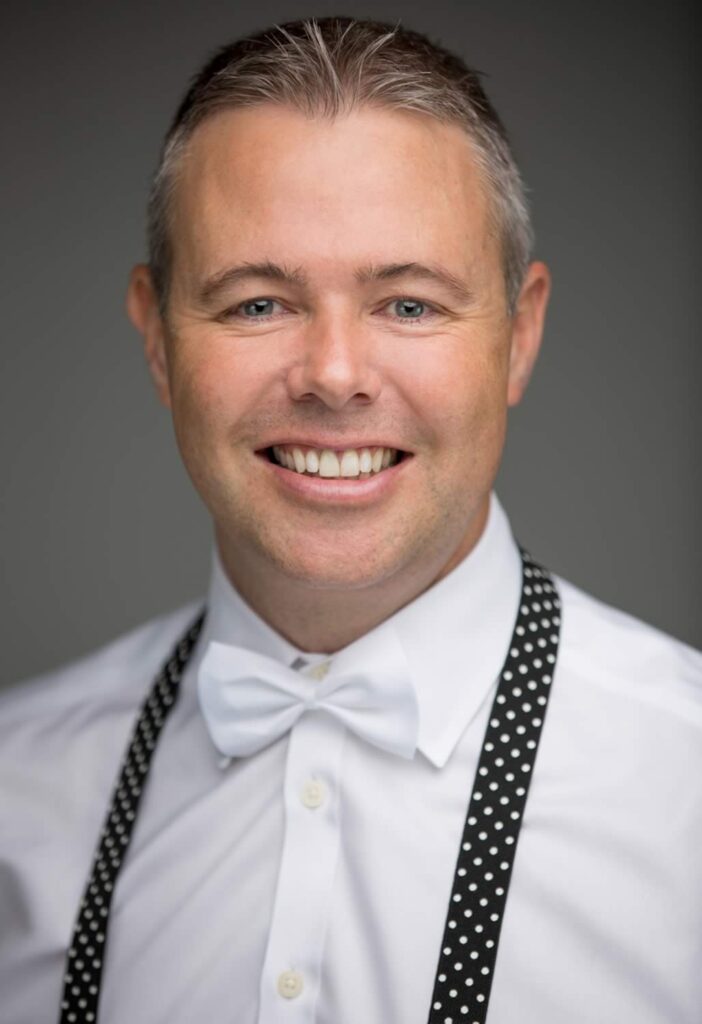 professional headshot - man with bow tie - by hero shot photography
