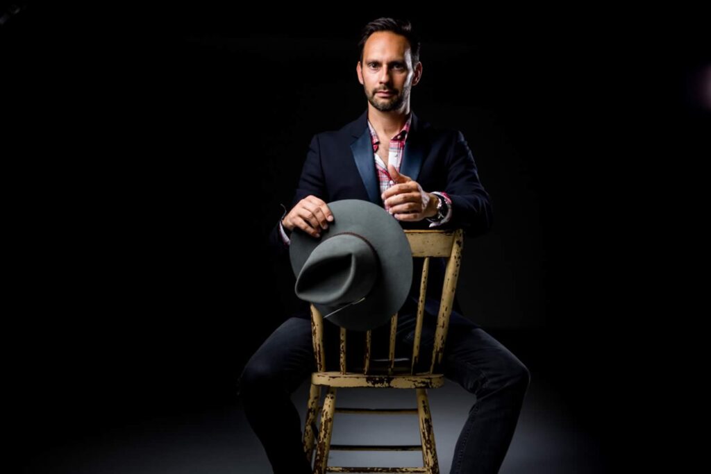 professional headshot - man on chair - by hero shot photography