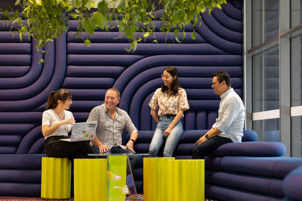 Google team in Sydney at work collaborating in modern interior