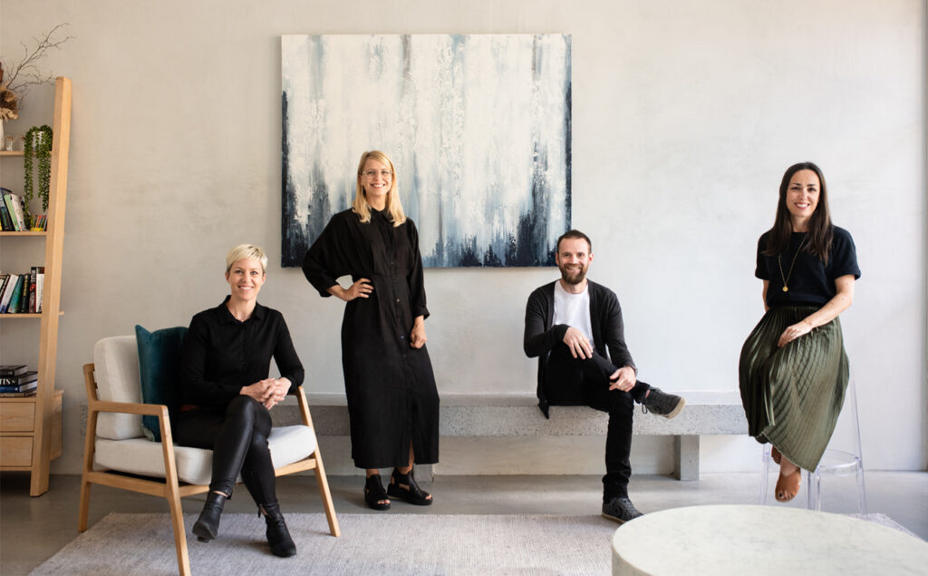 team portrait in an architectural space