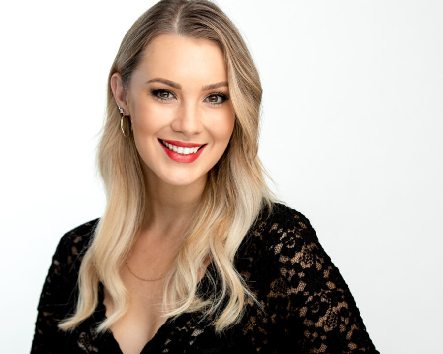 linkedIn Headshot of a female with blonde hair smiling